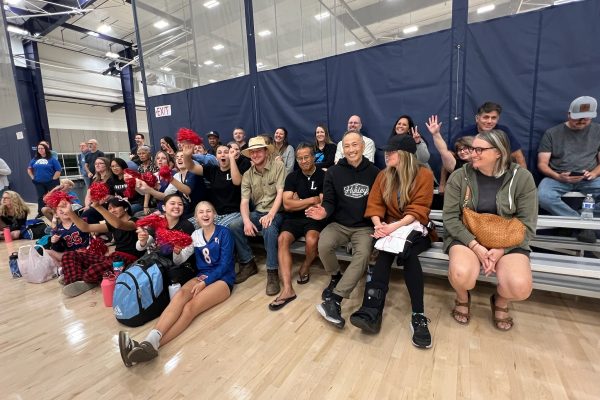 Sports 2 Players, Parents, And Fans Cheering At A Game