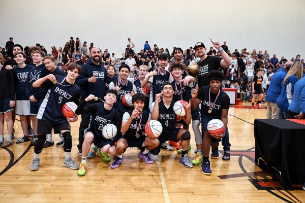 Sports 1 Team Impact Boys Basketball Posing With First Place Medals