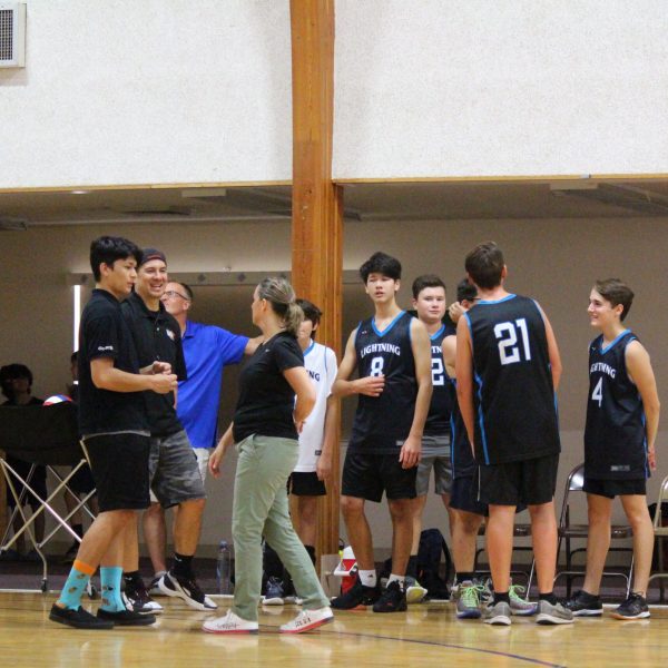 Volunteer 4 Volleyball Coaches Talking Before A Match